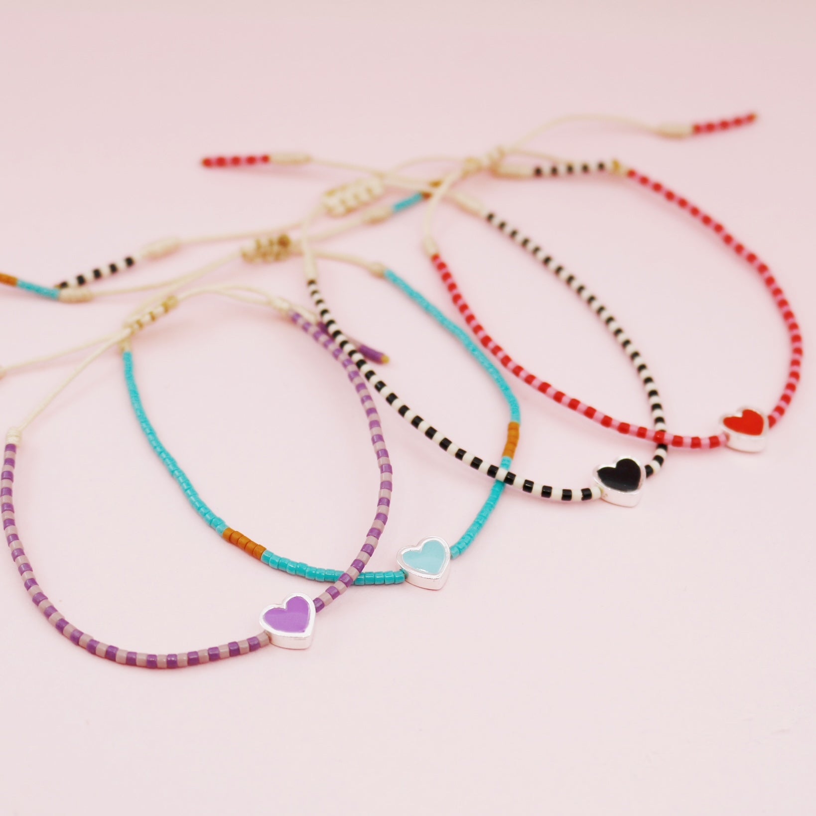 Pulsera Mostacilla 4 Corazones Rojo