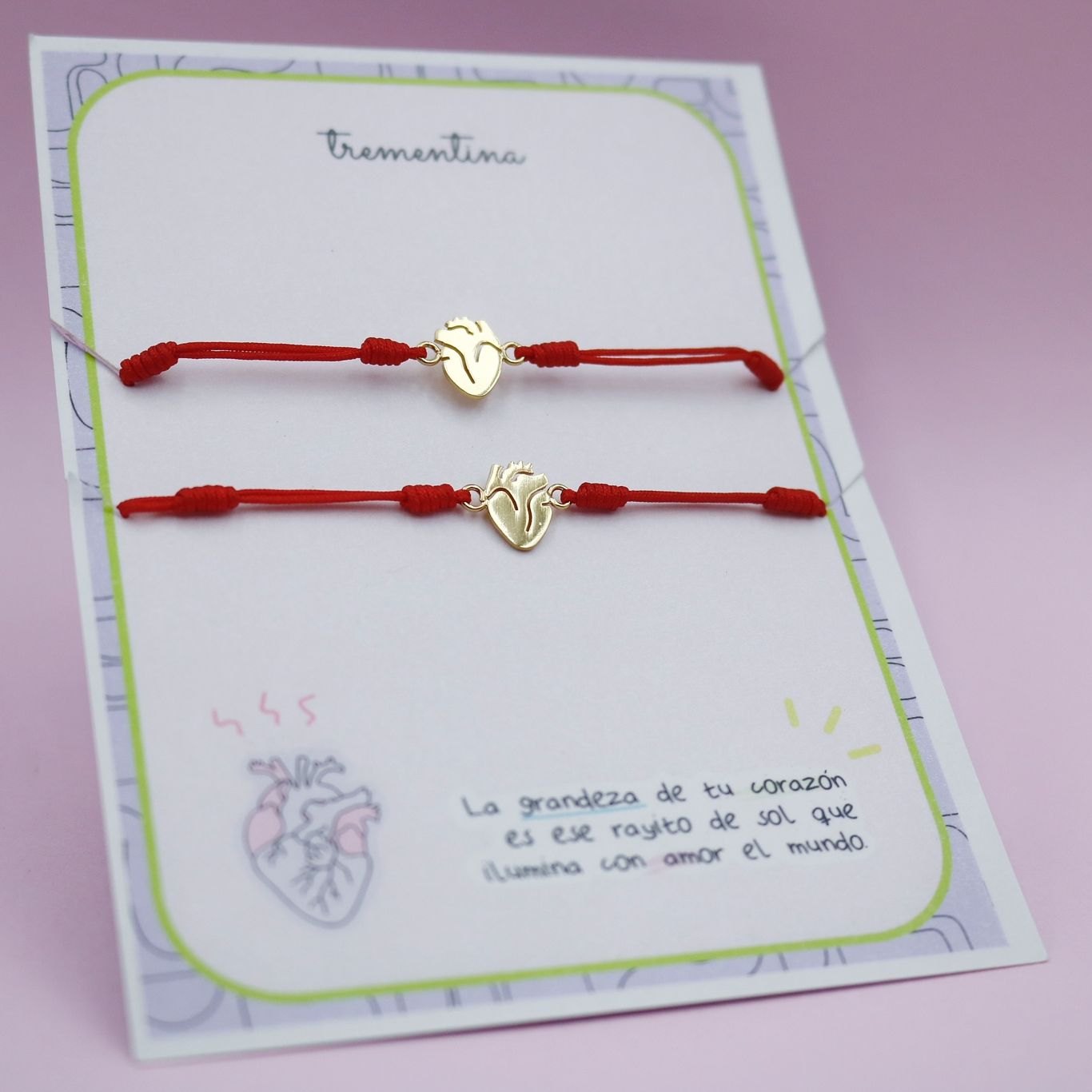 Set de dos Pulseras Doradas Un Corazón que Late