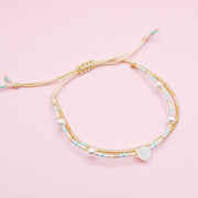 Pulsera Doble Dorada con Corazón en Nacar
